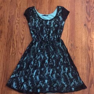 Green and black dress